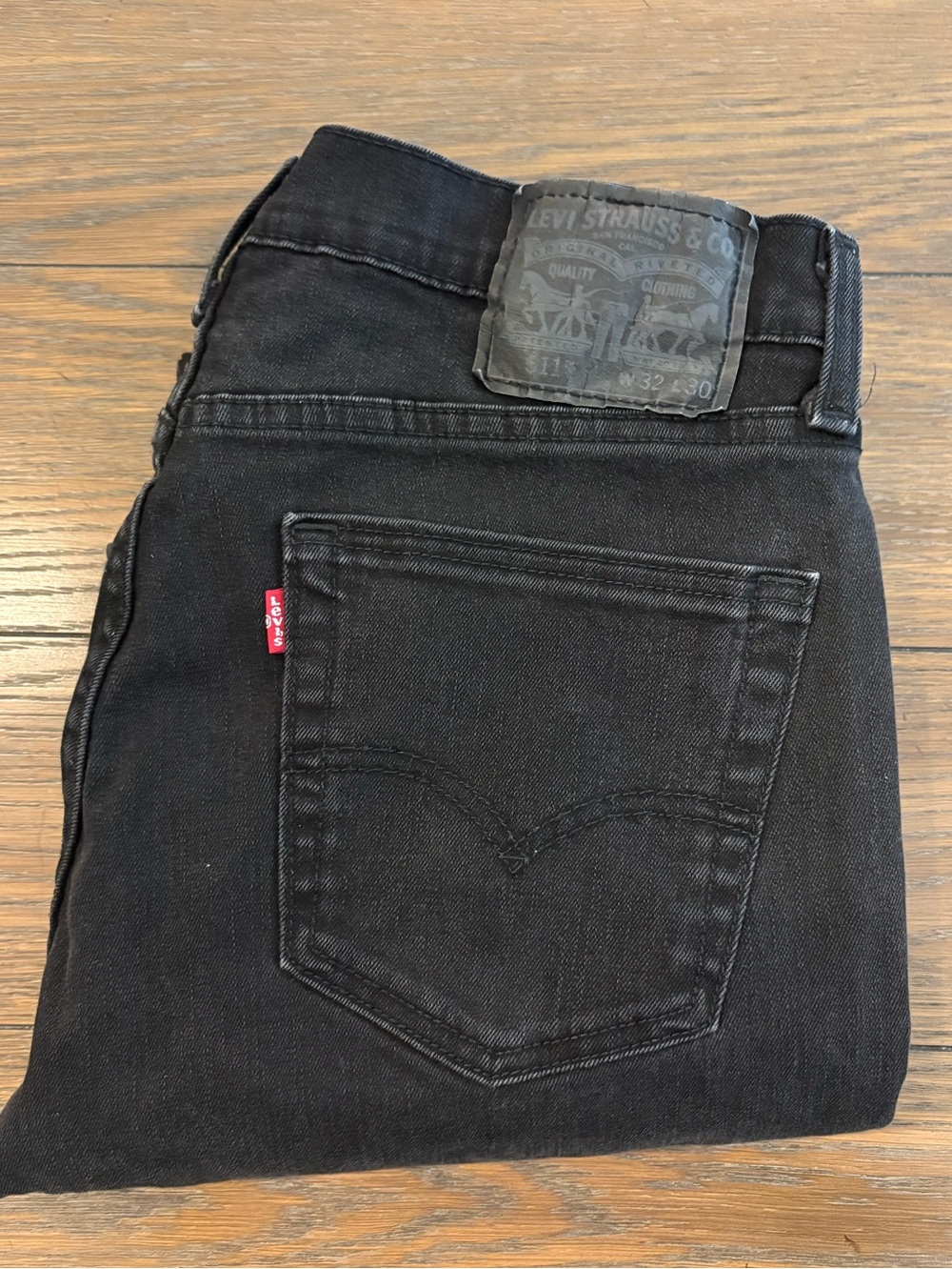 Levi's 511 Black Men's Jeans - Folded Back-Pocket View Size 32x30